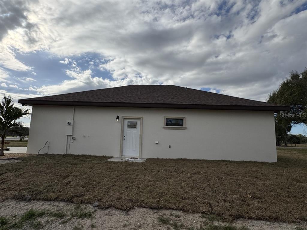 2383 Southwest 2nd Court Okeechobee, FL 34974 - Photo 18 of 48 a house with a outdoor space