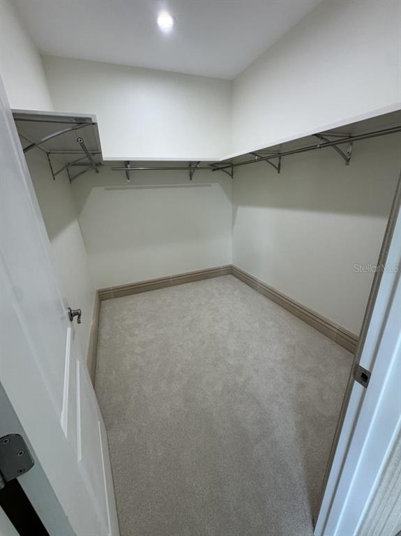 2383 Southwest 2nd Court Okeechobee, FL 34974 - Photo 25 of 48 a view of an empty walk in closet