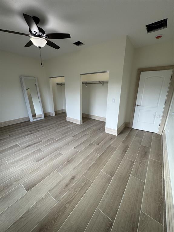 2383 Southwest 2nd Court Okeechobee, FL 34974 - Photo 33 of 48 a view of empty room with wooden floor