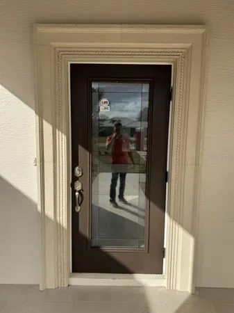 a view of a living room that has a fireplace