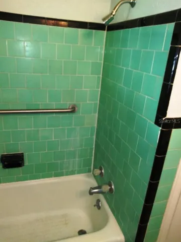 a bathroom with a sink and a bathtub