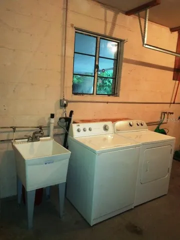 a bathroom with a sink and a bathtub