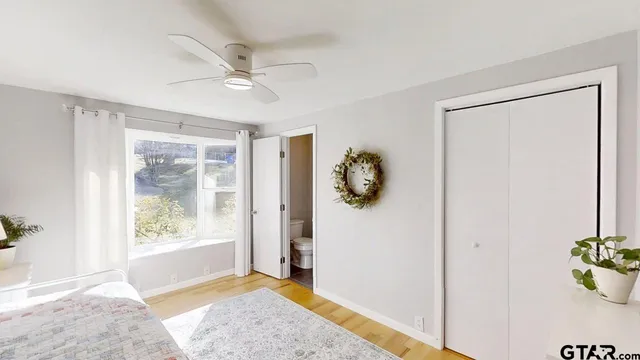 a view of an entryway and a window in a room
