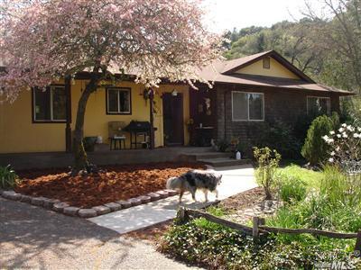 3635 Stallion Drive Santa Rosa, CA 95404 - Photo 1 of 1 a front view of a house with a yard