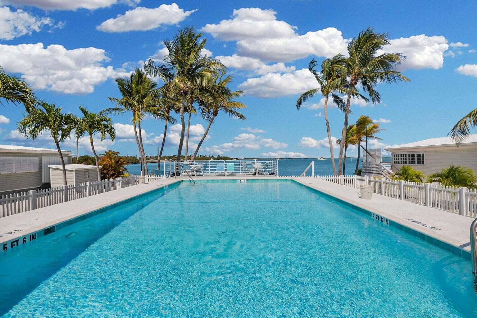 55 Boca Chica Road, Unit 85 Key West, FL 33040 - Photo 19 of 47 a view of yard with swimming pool and sitting area