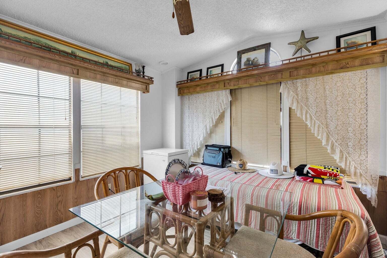 55 Boca Chica Road, Unit 85 Key West, FL 33040 - Photo 2 of 47 a view of a dining room with furniture window and outside view
