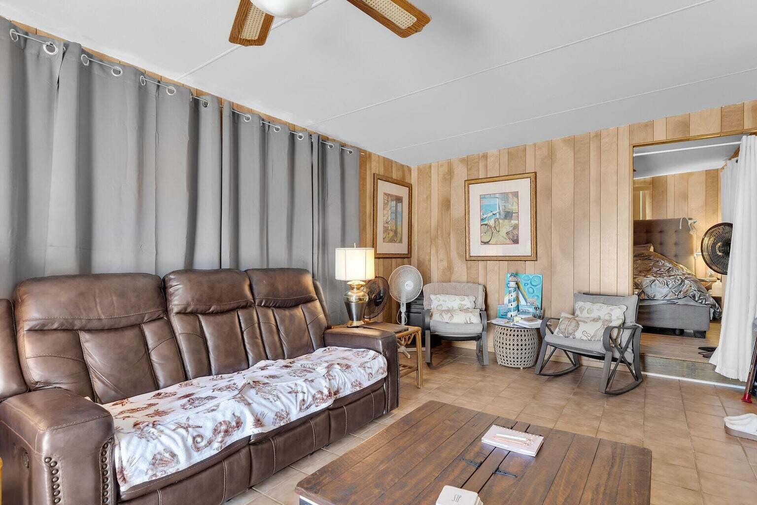 55 Boca Chica Road, Unit 85 Key West, FL 33040 - Photo 22 of 47 a living room with furniture and a window