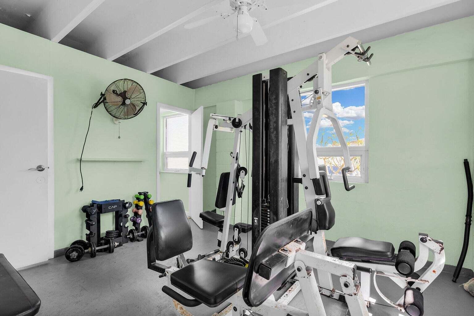55 Boca Chica Road, Unit 85 Key West, FL 33040 - Photo 25 of 47 a view of a room with gym equipment