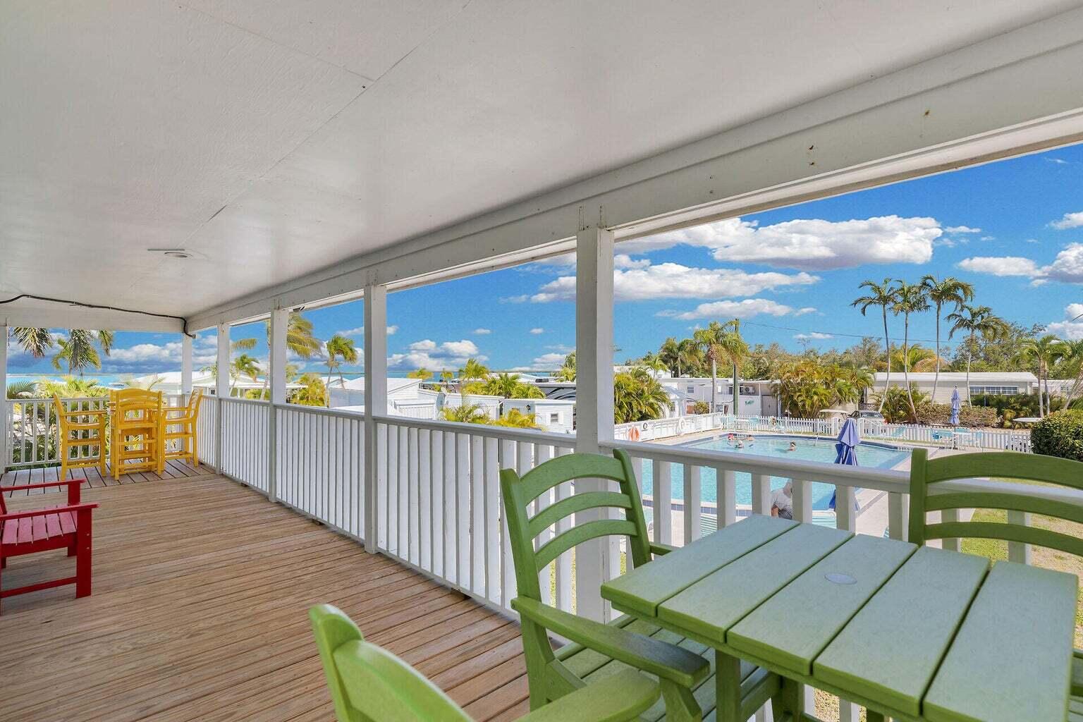 55 Boca Chica Road, Unit 85 Key West, FL 33040 - Photo 38 of 47 a view of a city from a balcony with furniture