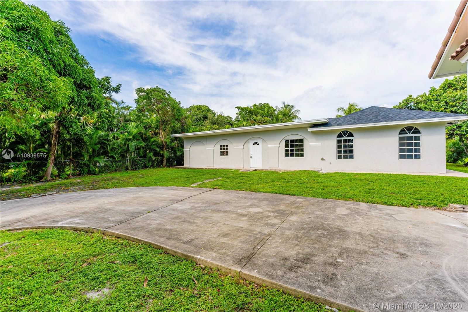 3684 Northwest 3rd Avenue Boca Raton, FL 33431 - Photo 37 of 44 Backyard Driveway