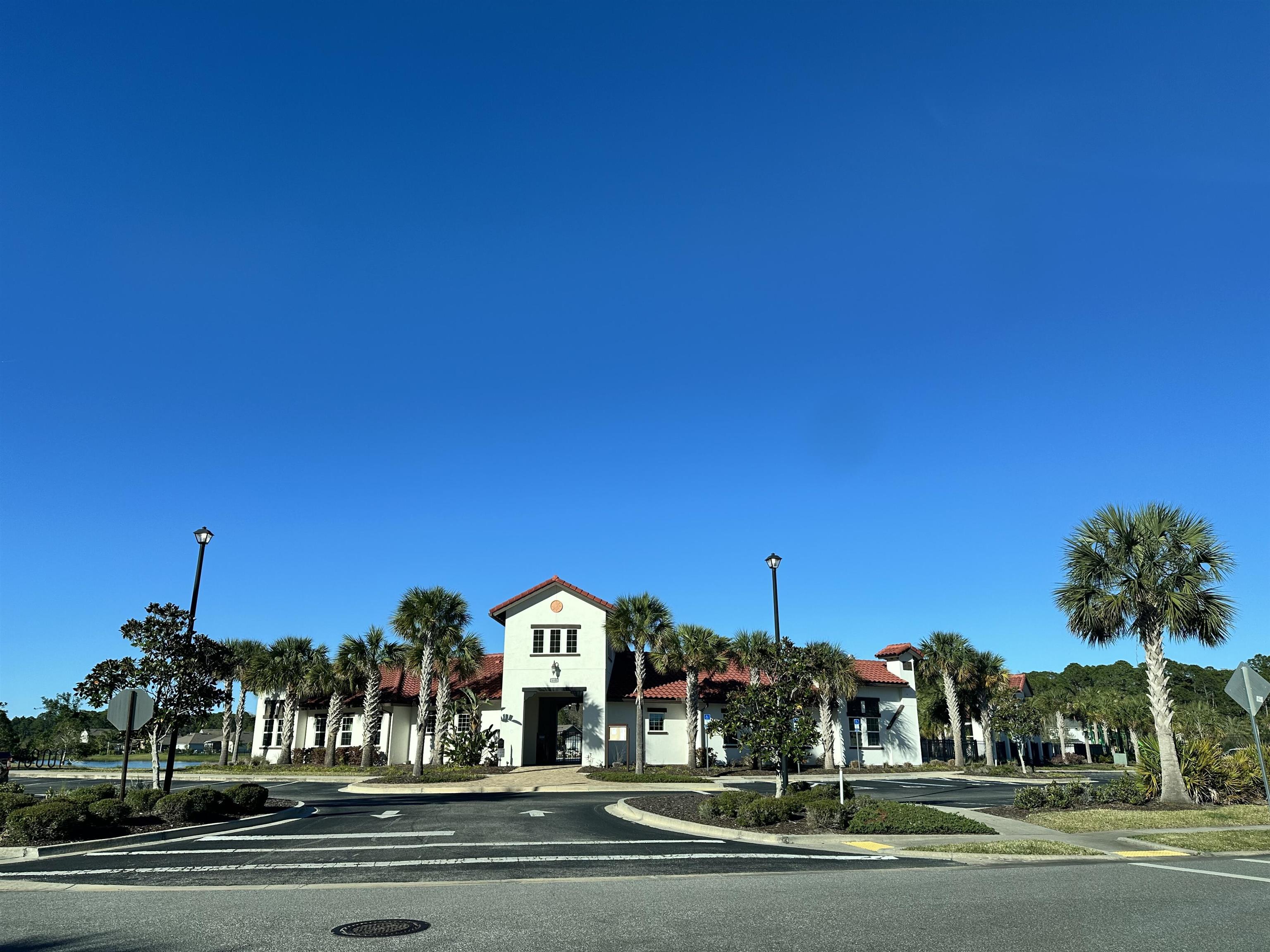 35 Root Lane St. Augustine, FL 32084 - Photo 13 of 16 a view of building with trees