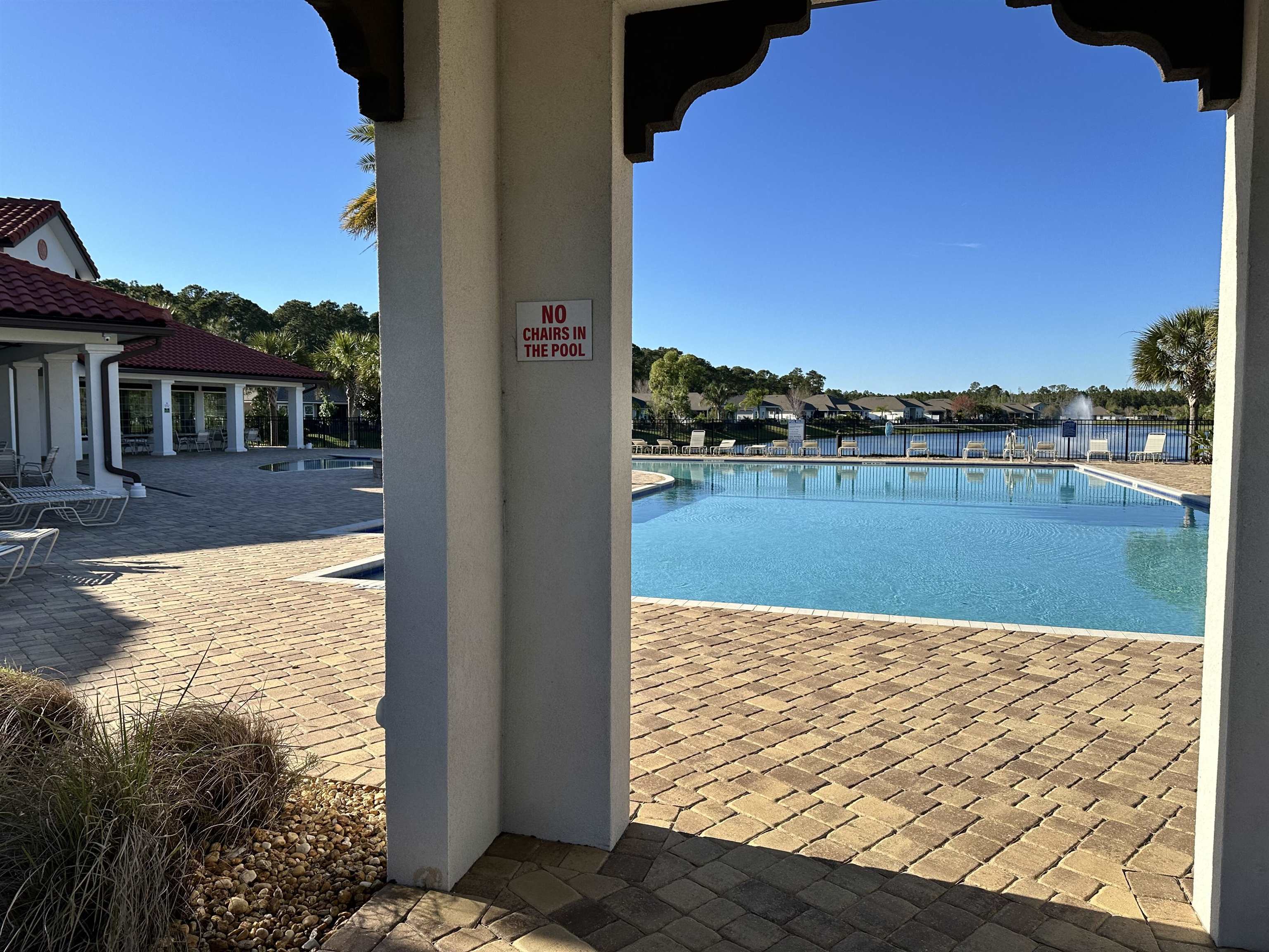 35 Root Lane St. Augustine, FL 32084 - Photo 15 of 16 a view of a lake with a house
