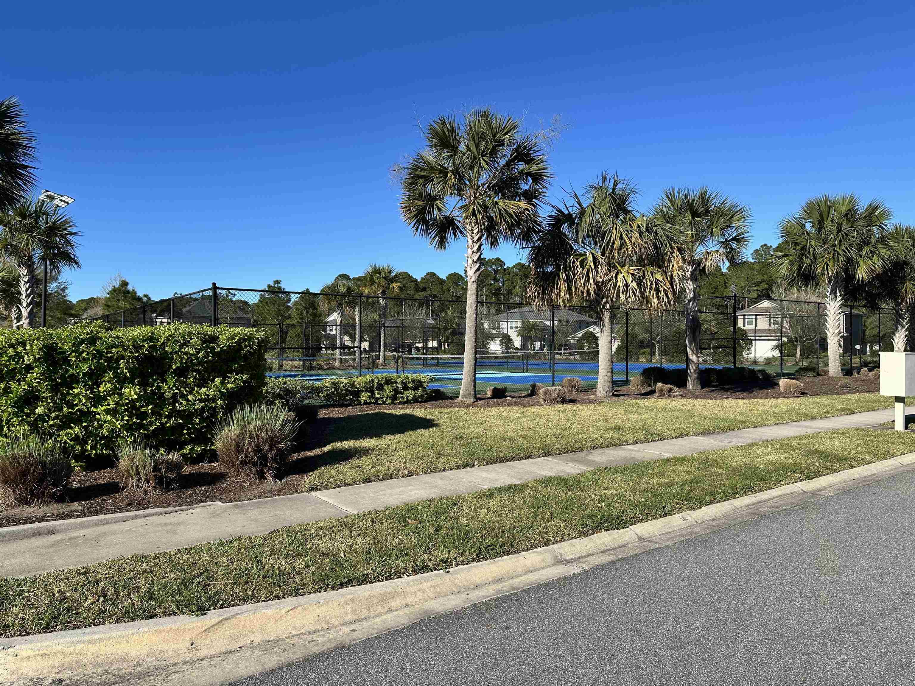 35 Root Lane St. Augustine, FL 32084 - Photo 16 of 16 a view of a park that has a car parked on the road