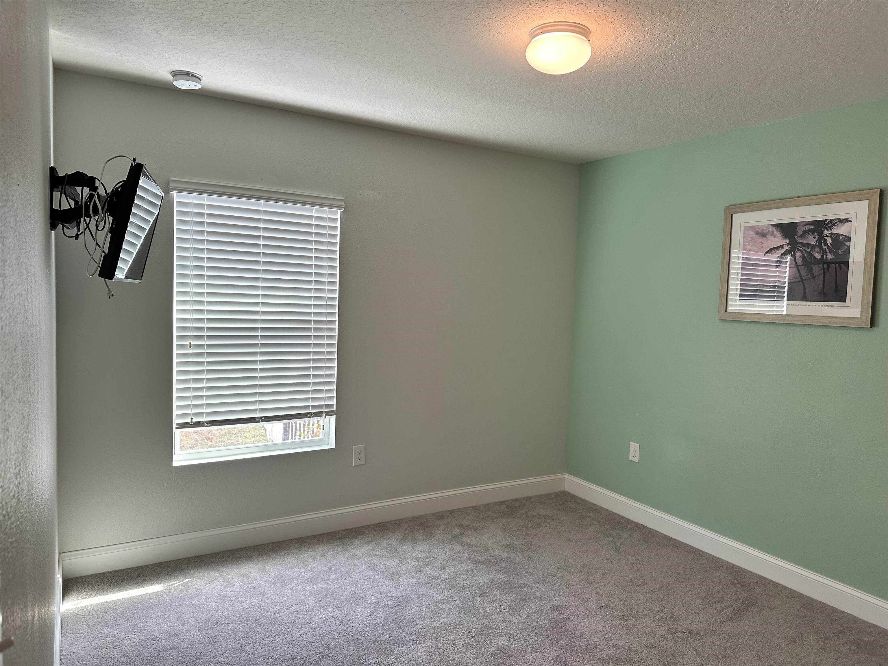 35 Root Lane St. Augustine, FL 32084 - Photo 7 of 16 an empty room with windows and closet