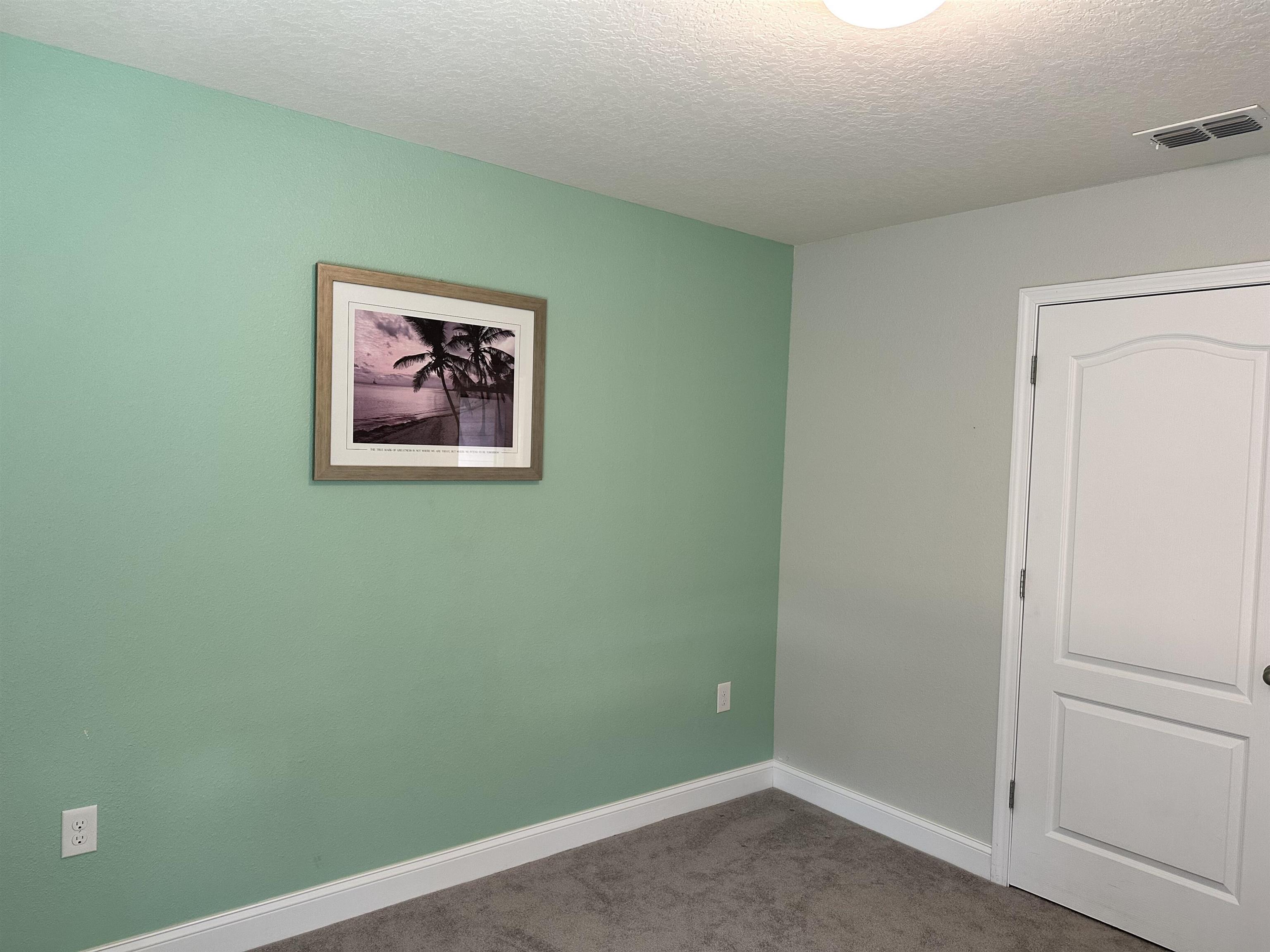 35 Root Lane St. Augustine, FL 32084 - Photo 9 of 16 an empty room with a window