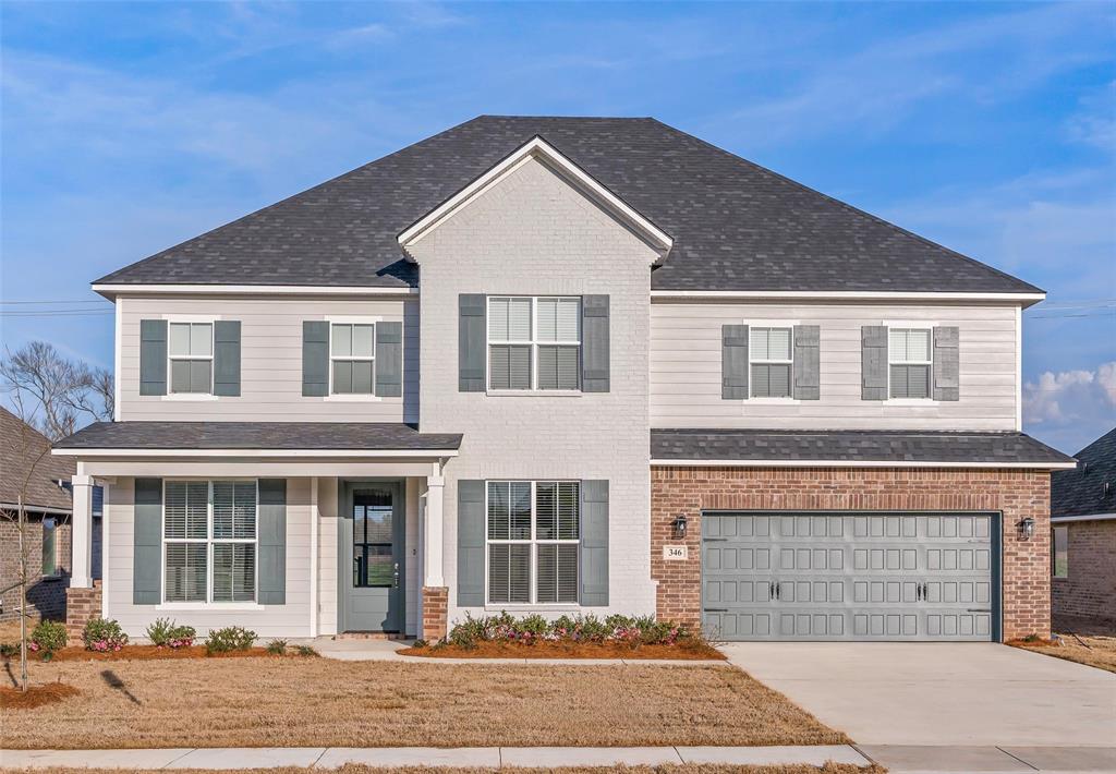 346 Prien Lk Loop Bossier City, LA 71111 - Photo 1 of 1 a front view of a house with a yard