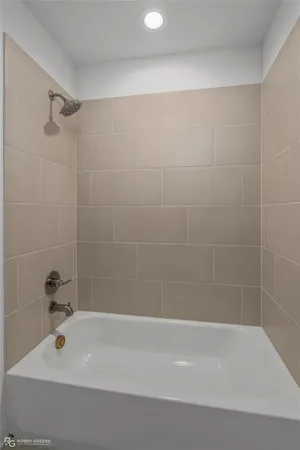 a bathroom with a bathtub