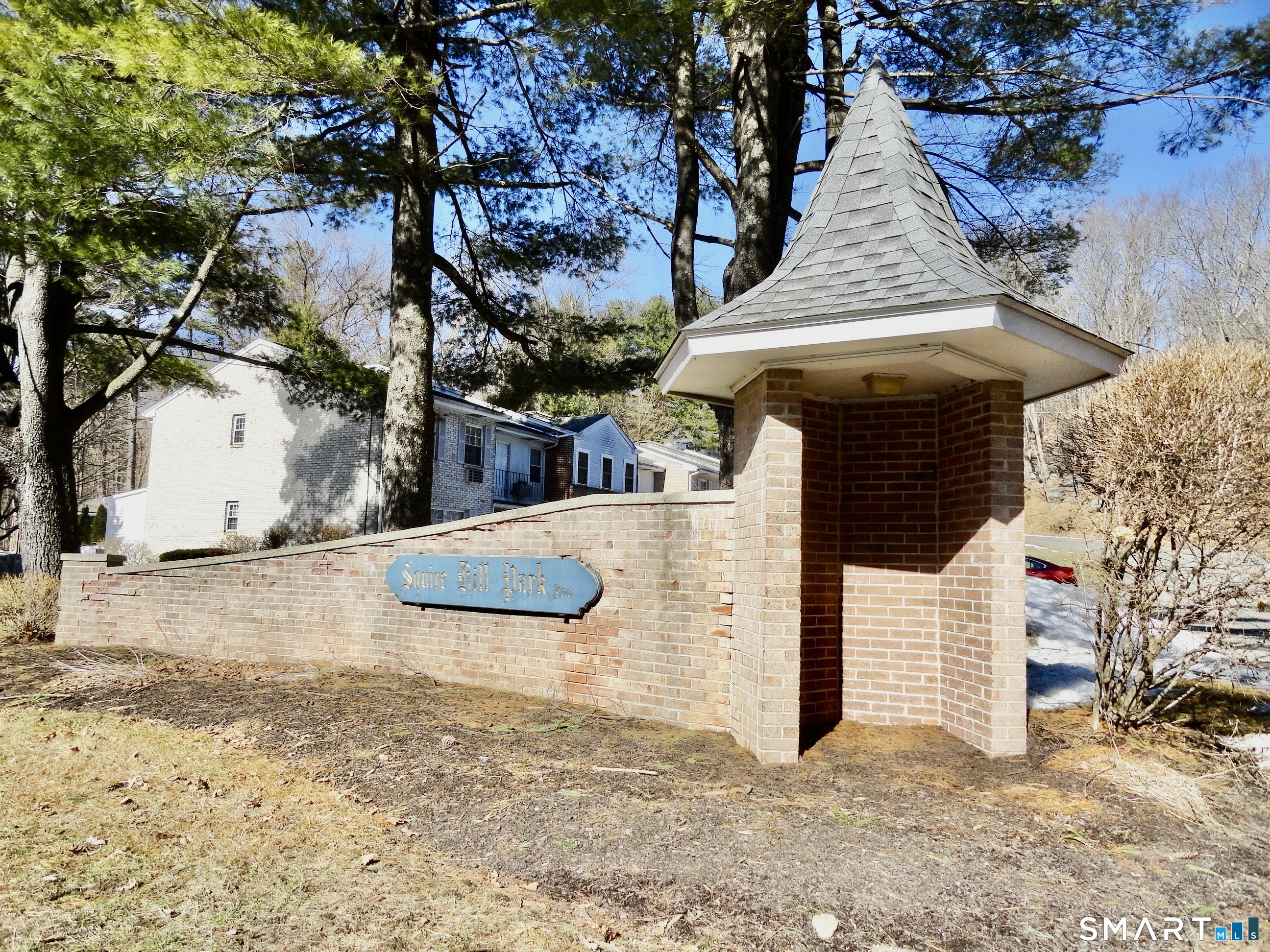 a view of a backyard of the house