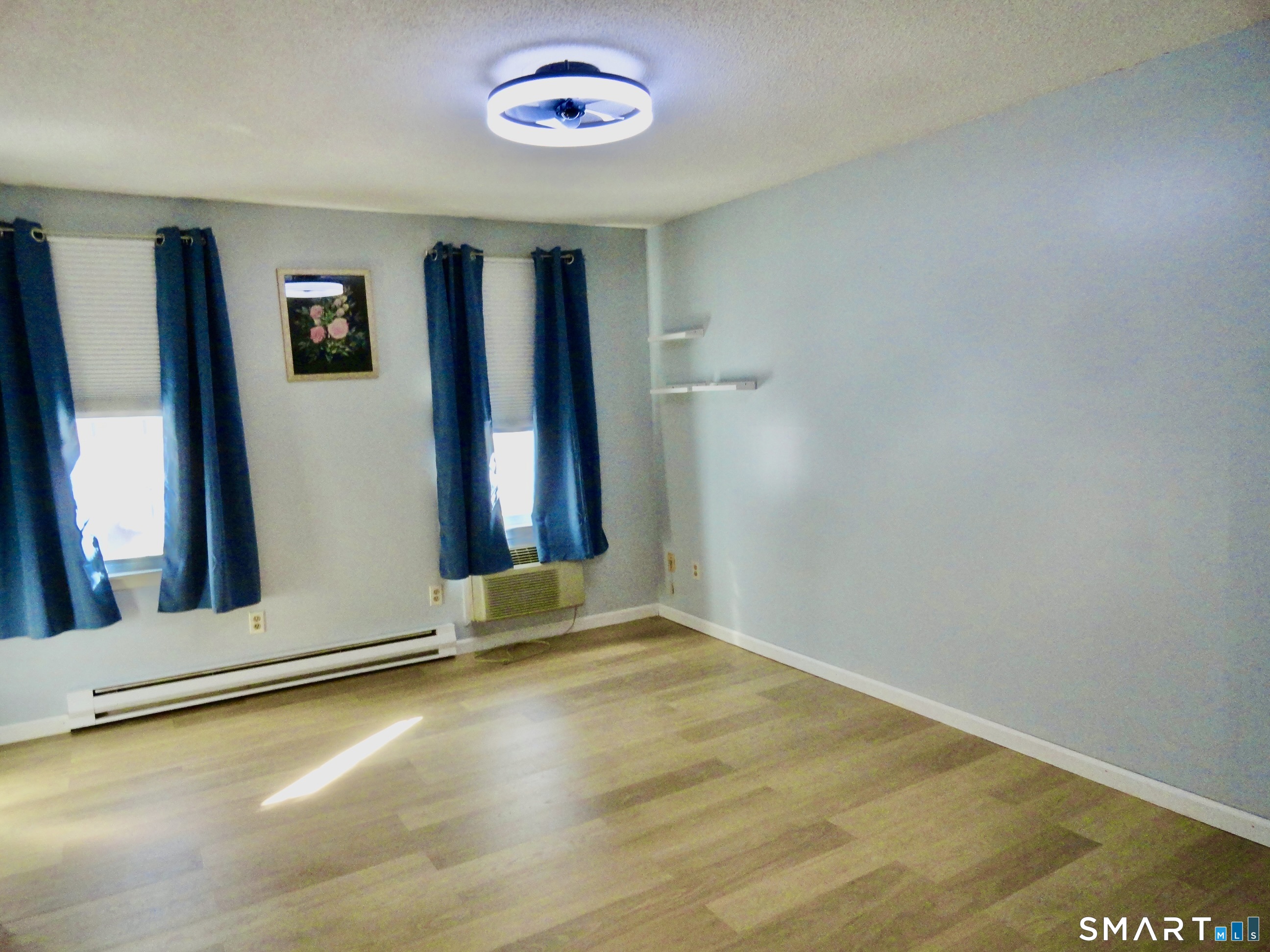 79 Hunter Court, Unit 79 Torrington, CT 06790 - Photo 13 of 19 an empty room with windows