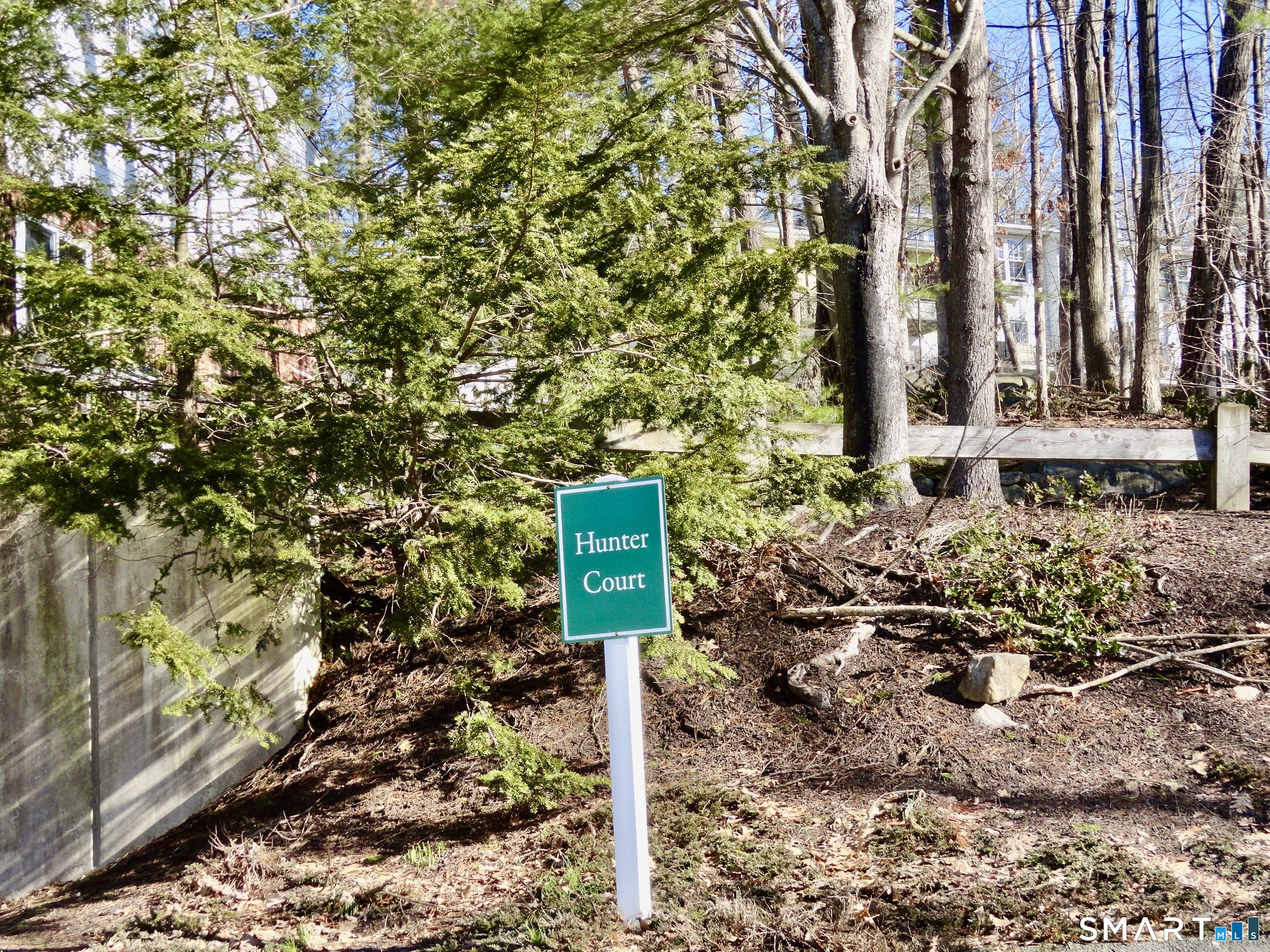 79 Hunter Court, Unit 79 Torrington, CT 06790 - Photo 4 of 19 a sign board with a house