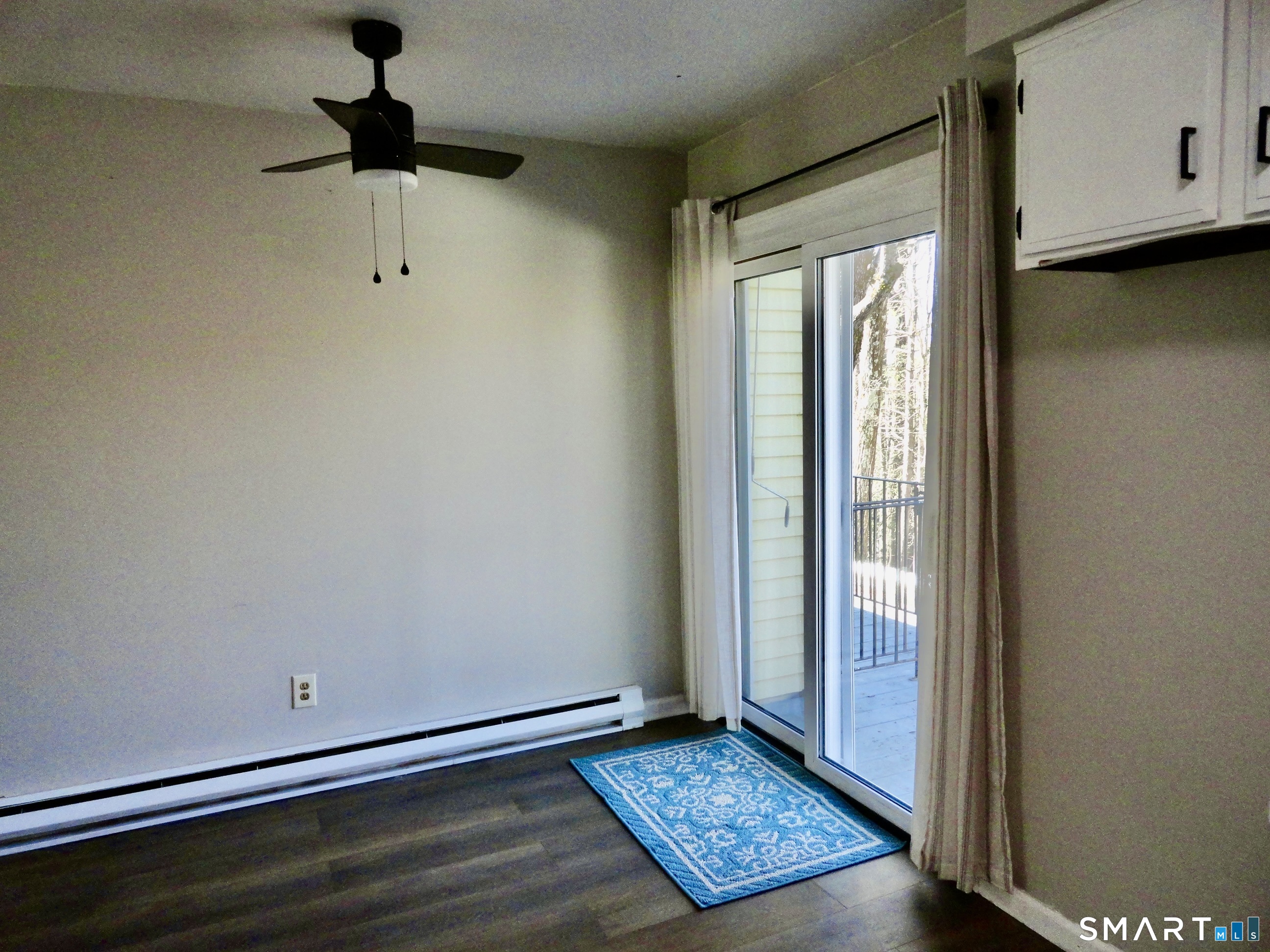 79 Hunter Court, Unit 79 Torrington, CT 06790 - Photo 7 of 19 a view of an empty room and window