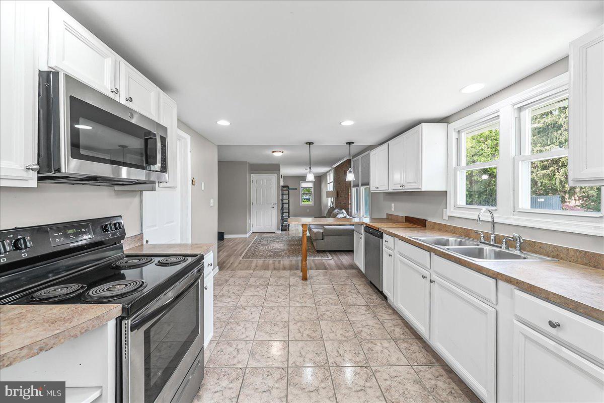 1019 Riverside Drive Pottstown, PA 19465 - Photo 13 of 36 Bright and airy modern kitchen space.