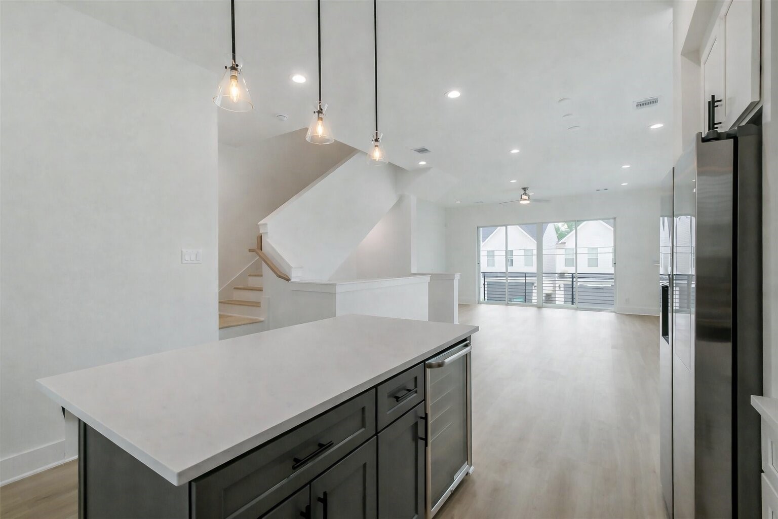 5703 Balbo Street, Unit F Houston, TX 77091 - Photo 16 of 39 a view of a kitchen with a sink and chandelier