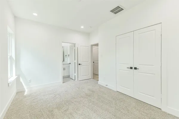 a bathroom with a bathtub and a toilet
