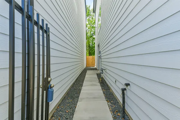 a view of a pathway with a balcony