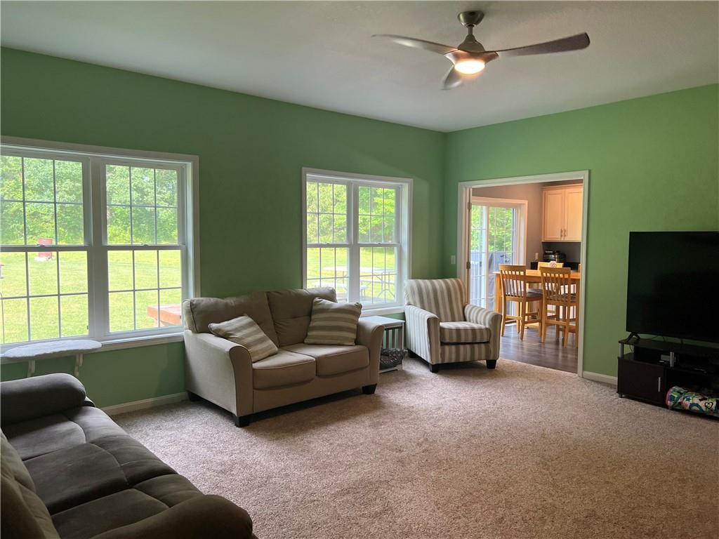 3643 Longview Road Hermitage, PA 16148 - Photo 11 of 23 a living room with furniture and a flat screen tv