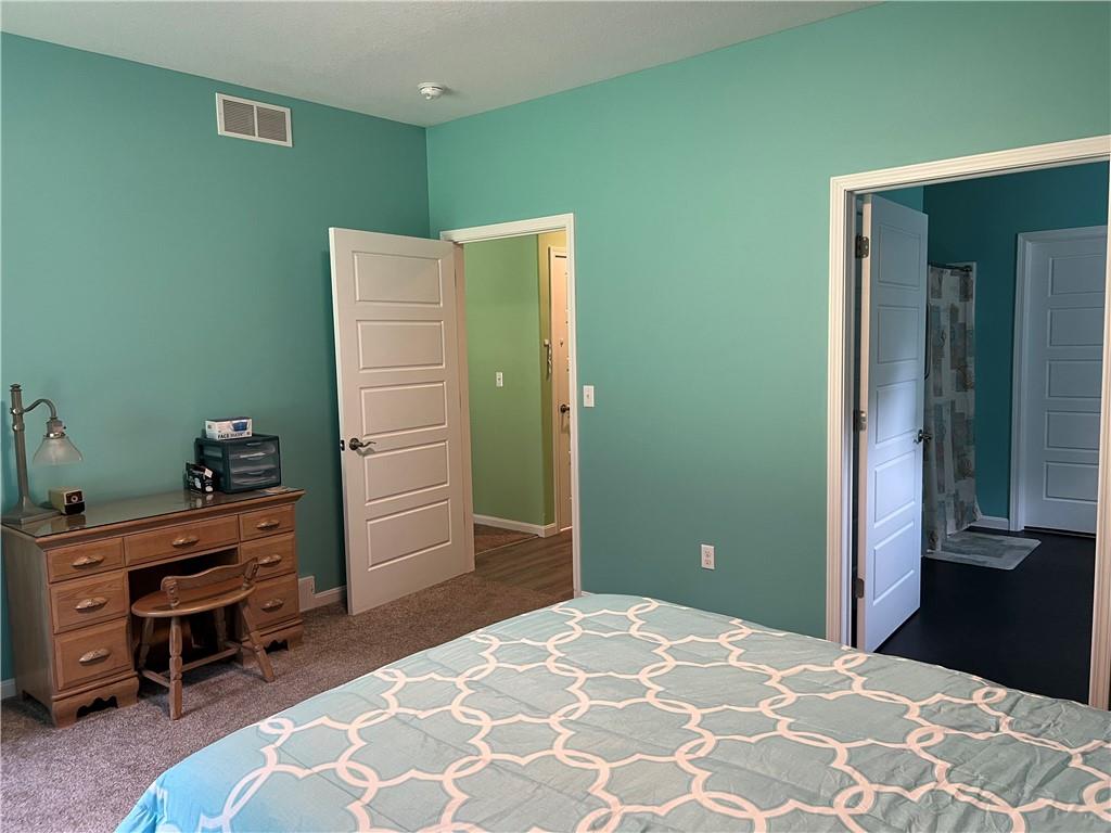 3643 Longview Road Hermitage, PA 16148 - Photo 16 of 23 a bedroom with a bed and a dresser