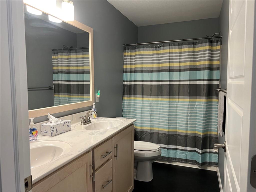 3643 Longview Road Hermitage, PA 16148 - Photo 23 of 23 a bathroom with a sink a toilet and shower