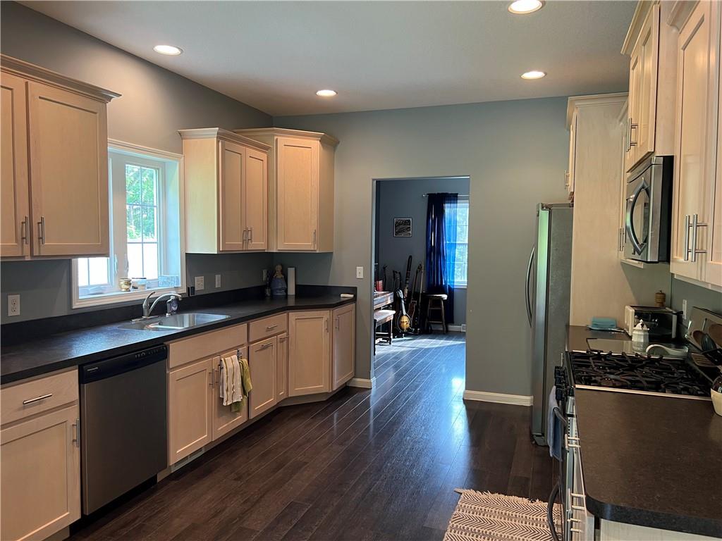 3643 Longview Road Hermitage, PA 16148 - Photo 8 of 23 a large kitchen with stainless steel appliances granite countertop a lot of counter space and wooden floor