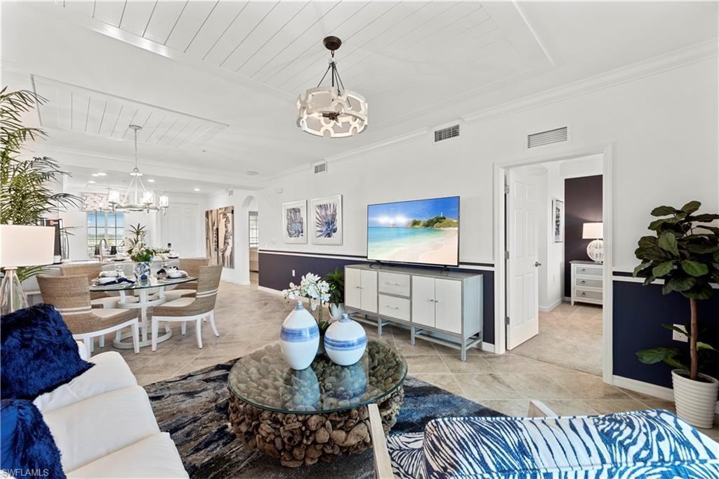 5715 Double Eagle Circle, Unit 4414 Immokalee, FL 34142 - Photo 12 of 20 a living room with furniture and a wooden floor