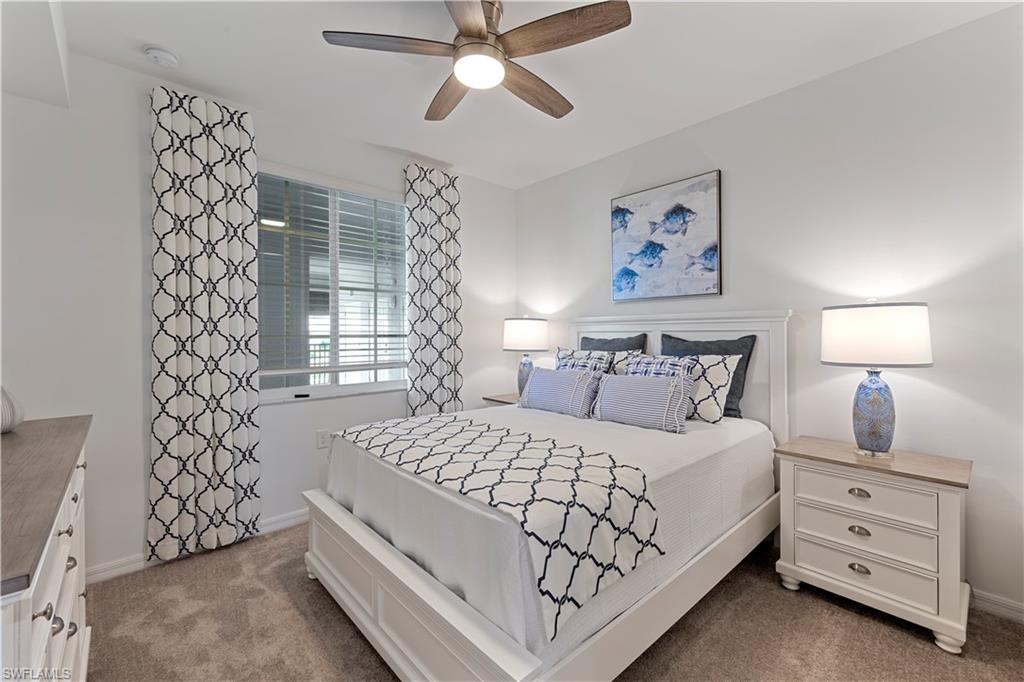 5715 Double Eagle Circle, Unit 4414 Immokalee, FL 34142 - Photo 16 of 20 a bedroom with a bed and a window