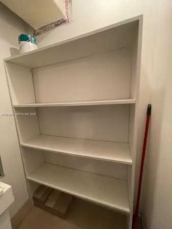 a storage room with washer and dryer