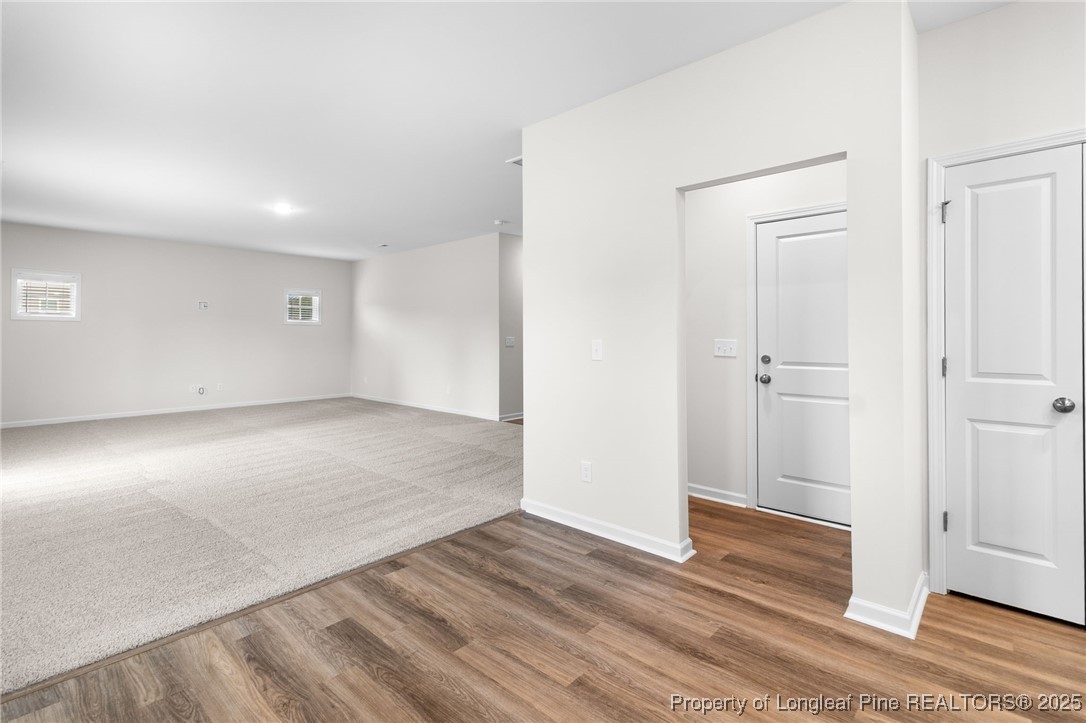 501 Traveller Way Raeford, NC 28376 - Photo 17 of 49 a view of empty room with wooden floor