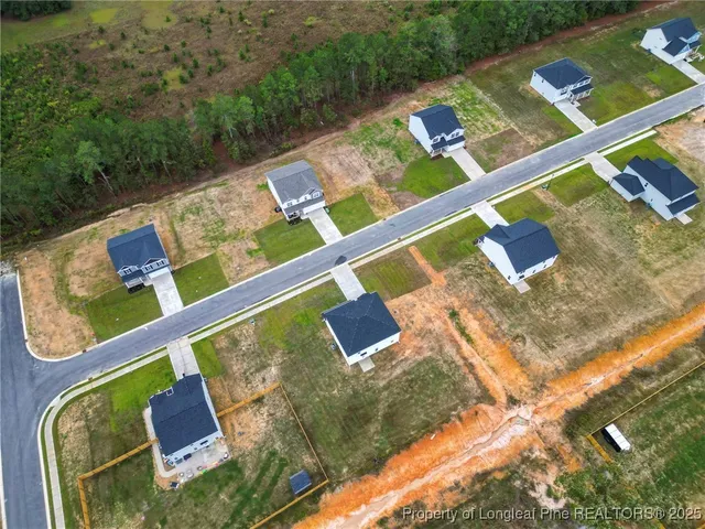 a view of a brick building from a living room