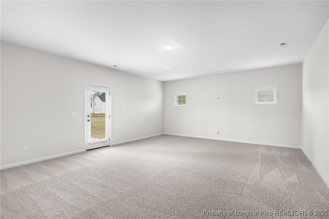 501 Traveller Way Raeford, NC 28376 - Photo 5 of 49 a view of an empty room with a window