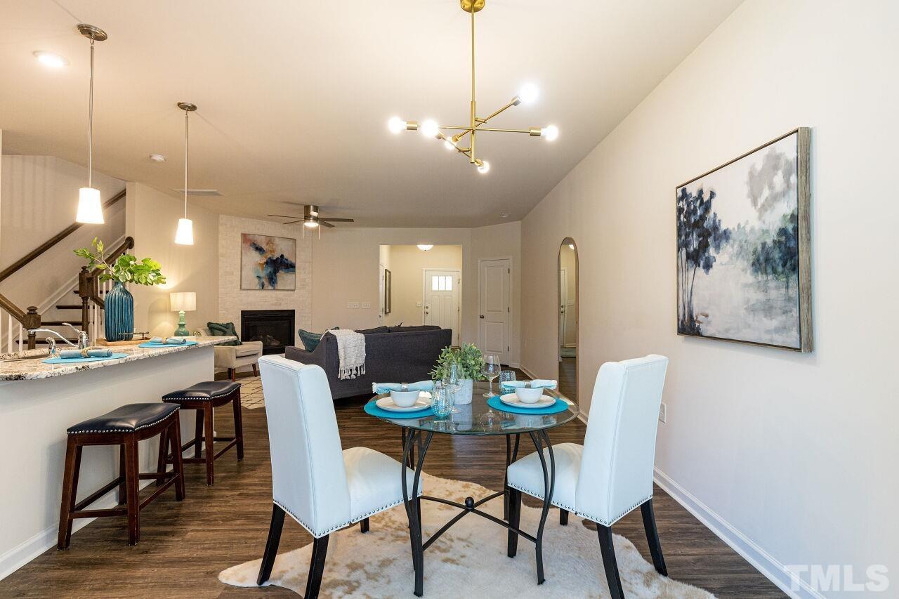 117 Lafferty Street Durham, NC 27560 - Photo 13 of 43 a view of a dining room with furniture