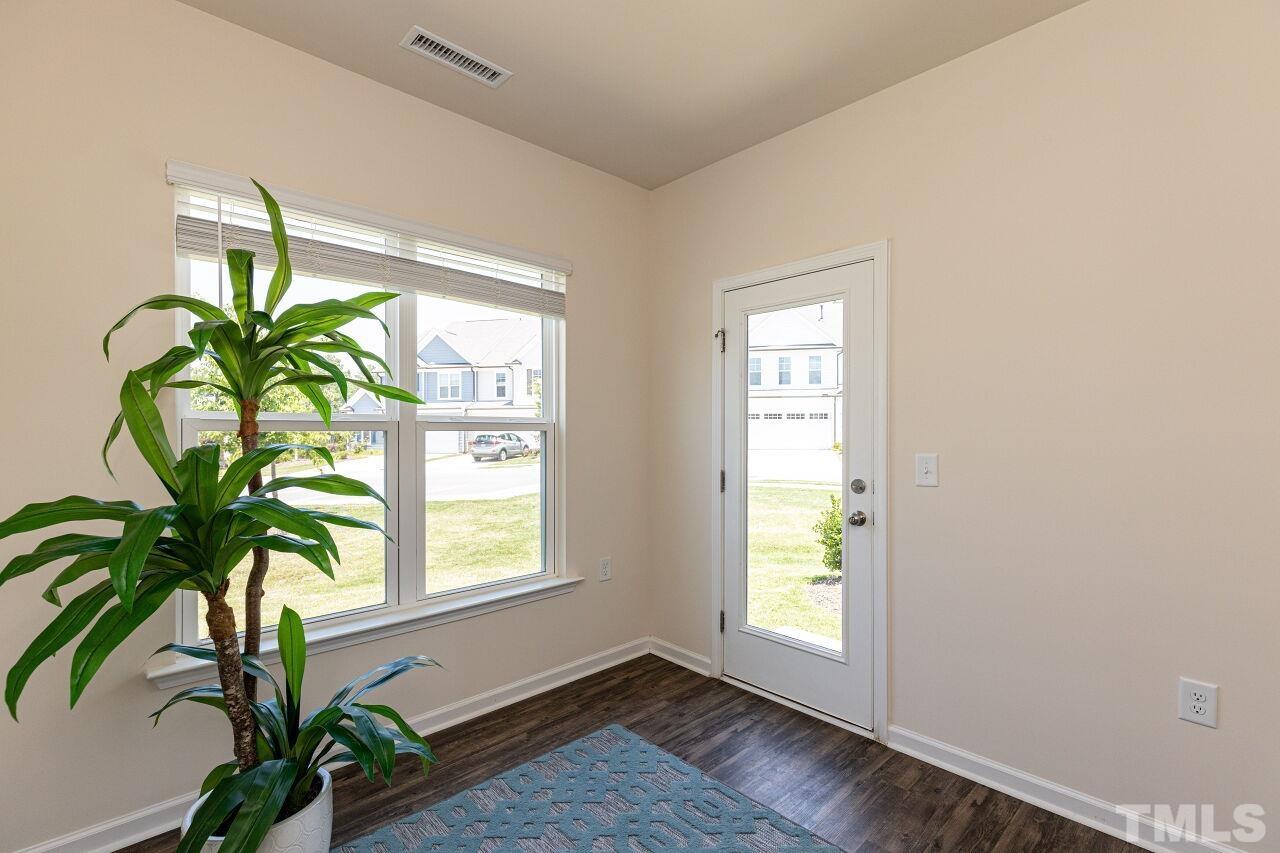 117 Lafferty Street Durham, NC 27560 - Photo 14 of 43 a view of an entryway with wooden floor