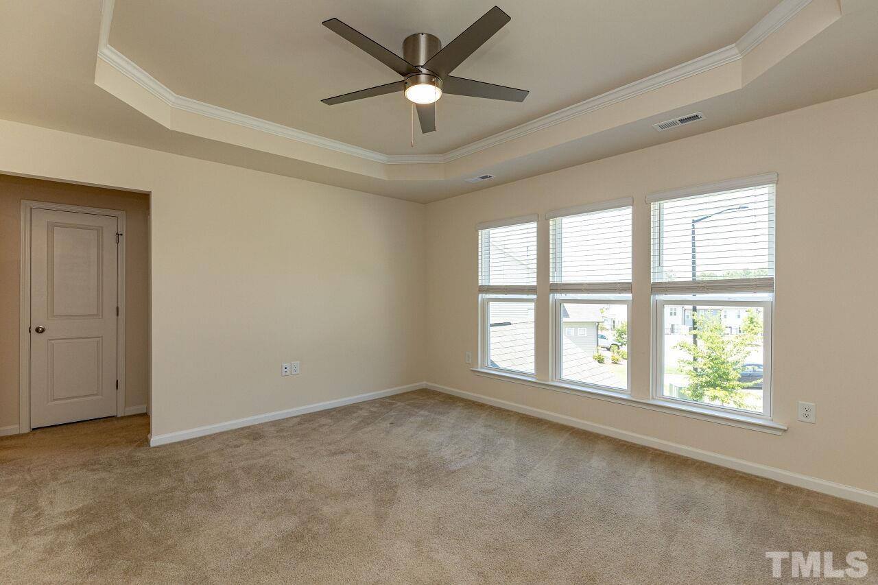 117 Lafferty Street Durham, NC 27560 - Photo 16 of 43 a view of an empty room with a window
