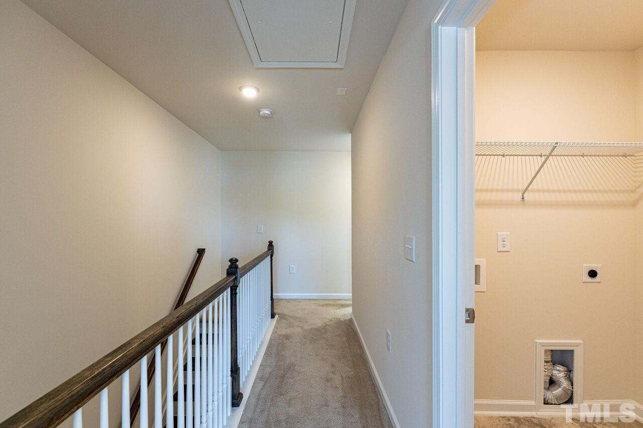 117 Lafferty Street Durham, NC 27560 - Photo 21 of 43 a view of a hallway with wooden floor and entryway