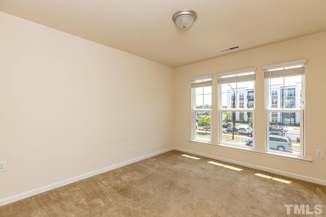 117 Lafferty Street Durham, NC 27560 - Photo 22 of 43 an empty room with a window