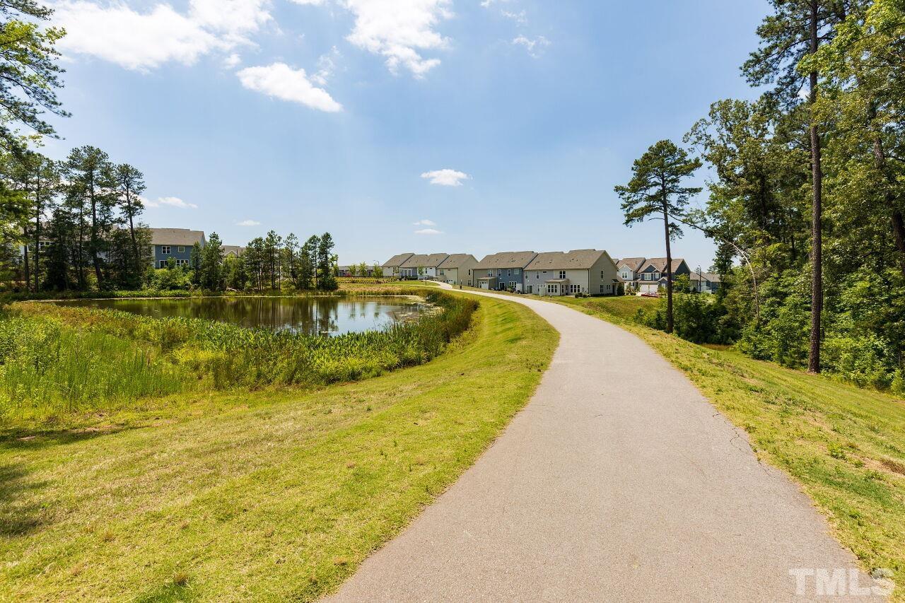 117 Lafferty Street Durham, NC 27560 - Photo 43 of 43 a view of a swimming pool with a yard