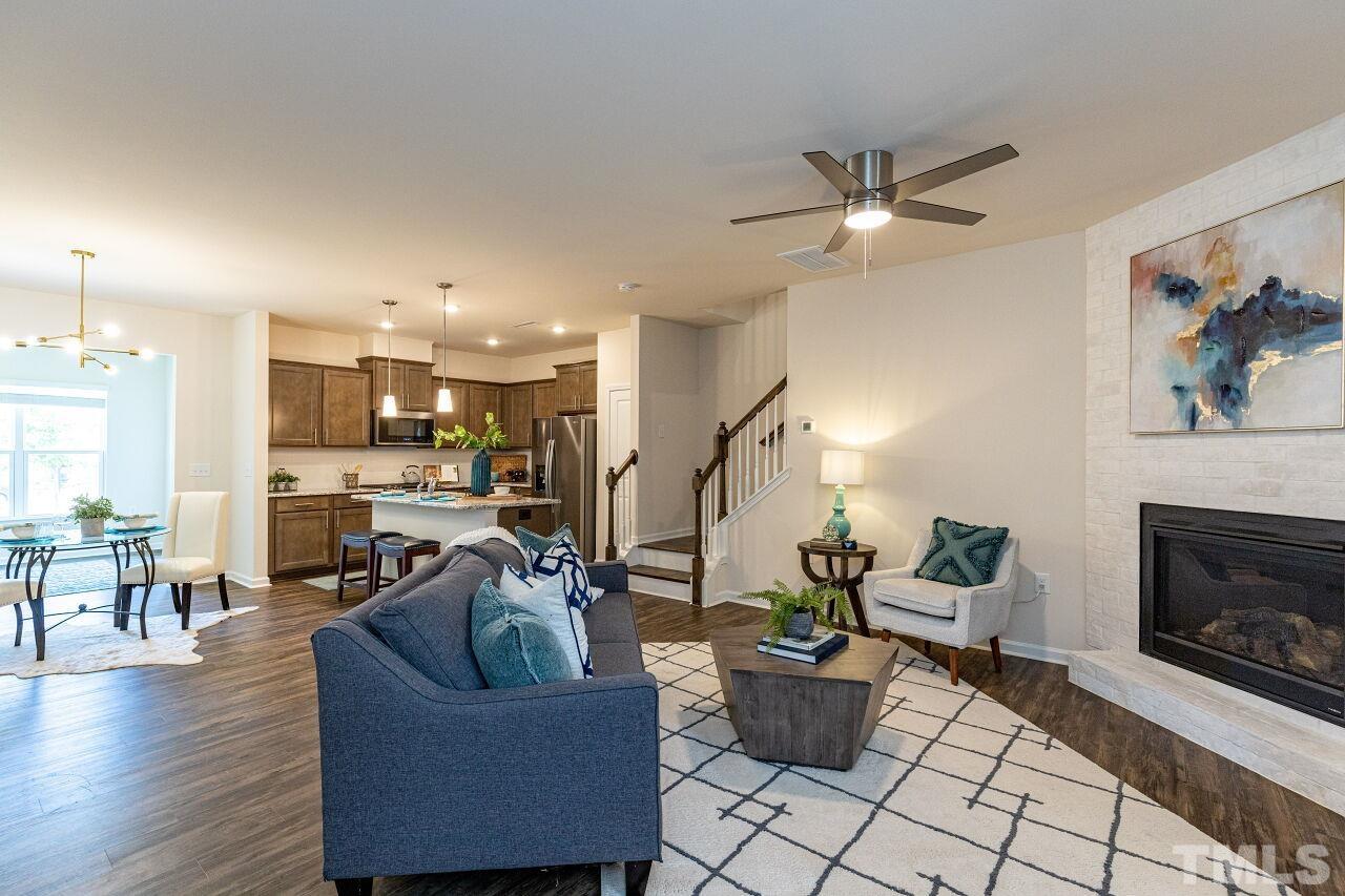 117 Lafferty Street Durham, NC 27560 - Photo 5 of 43 a living room with furniture and kitchen view
