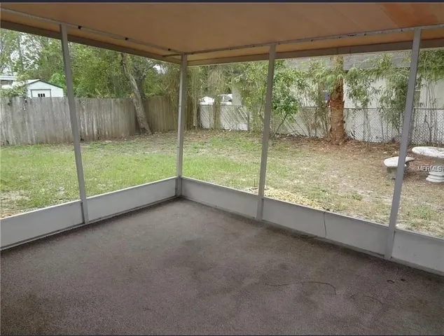 a view of an outdoor space with a big yard