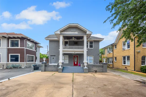 a front view of a building with street view
