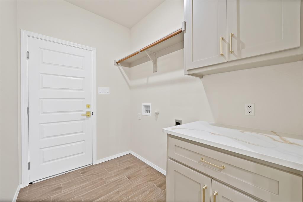 501 Harris Road Azle, TX 76020 - Photo 16 of 29 a view of cabinets and wooden floor