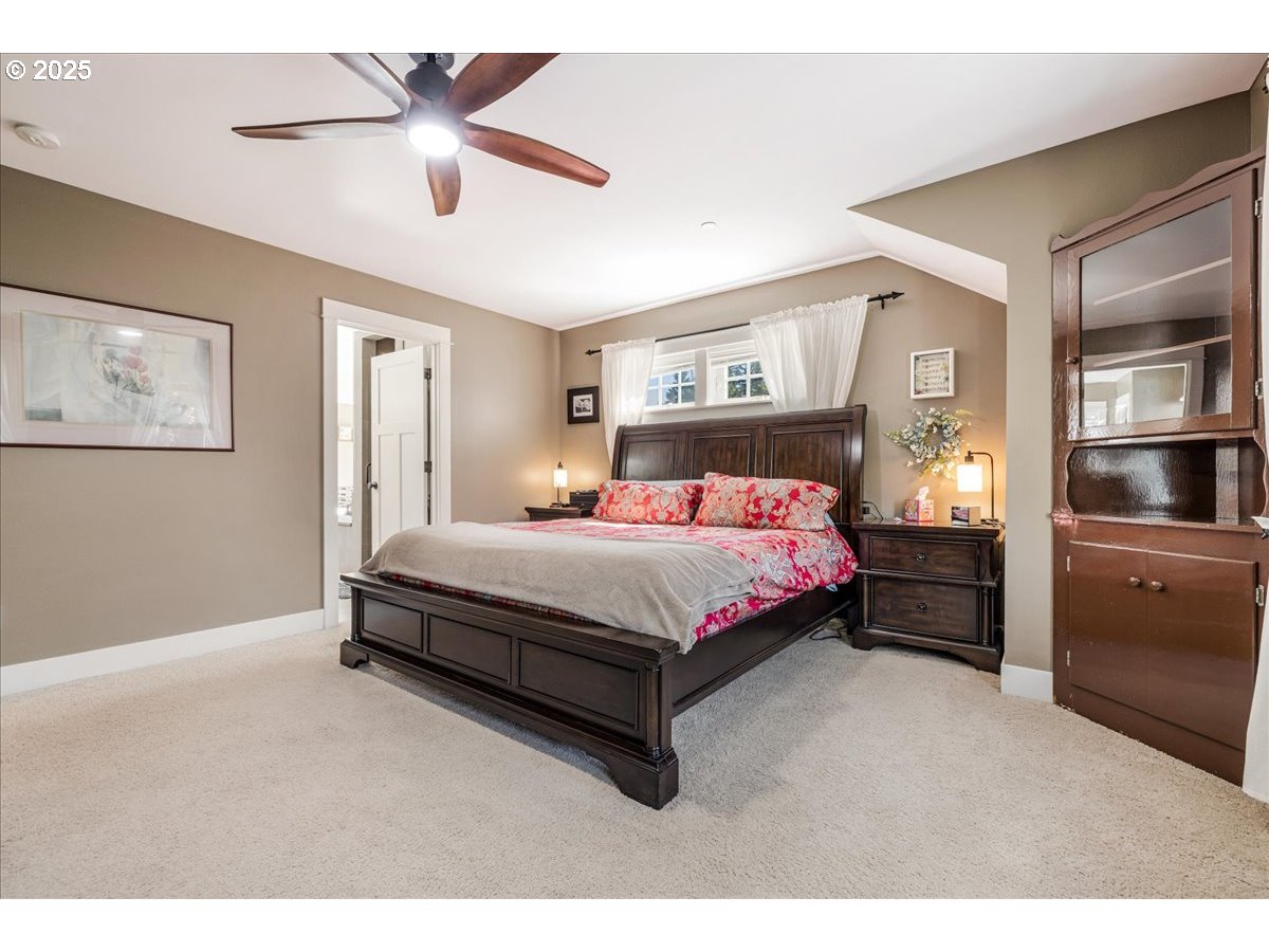 8250 Southwest Indigo Terrace Beaverton, OR 97007 - Photo 26 of 46 a bedroom with a bed and a walk in closet